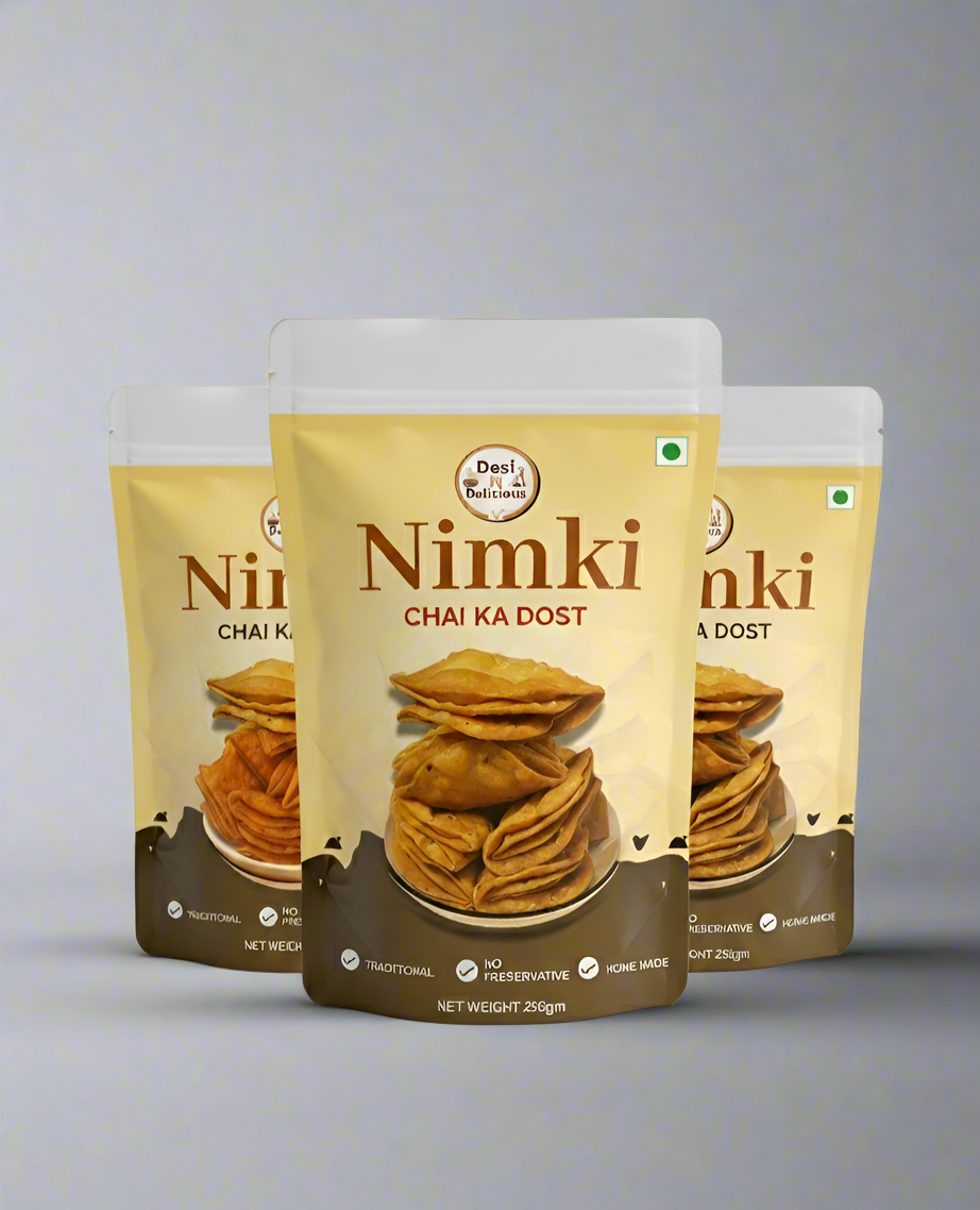 Three packages of Nimki with a gray gradient background