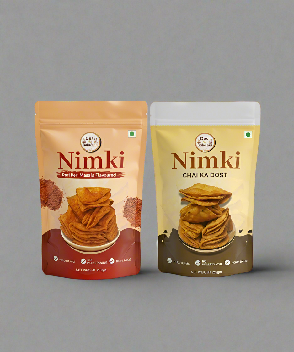 Two packages of Nimki snacks on a gray background